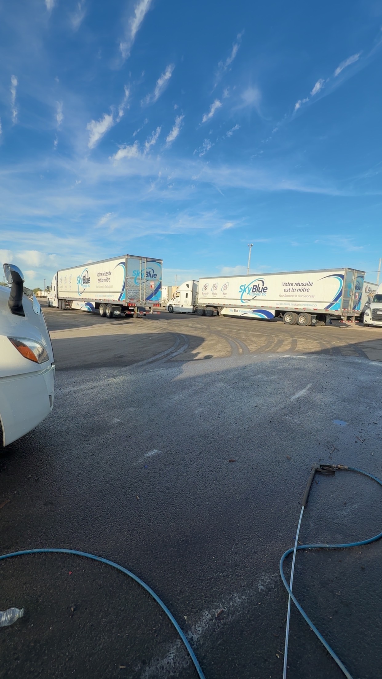 Sky Blue Express Trucks at Yard